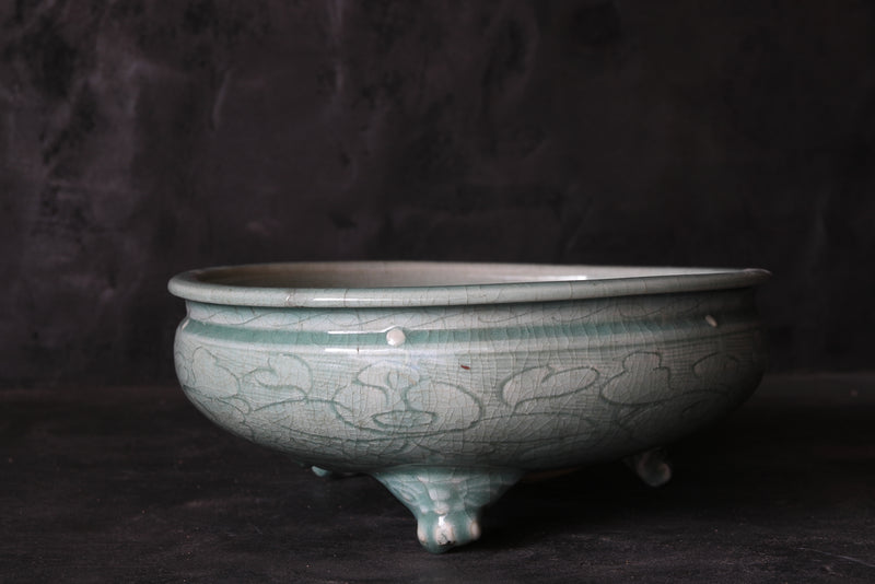 Celadon porcelain three-legged bowl with peony arabesque design Ming Dynasty/1368-1644CE