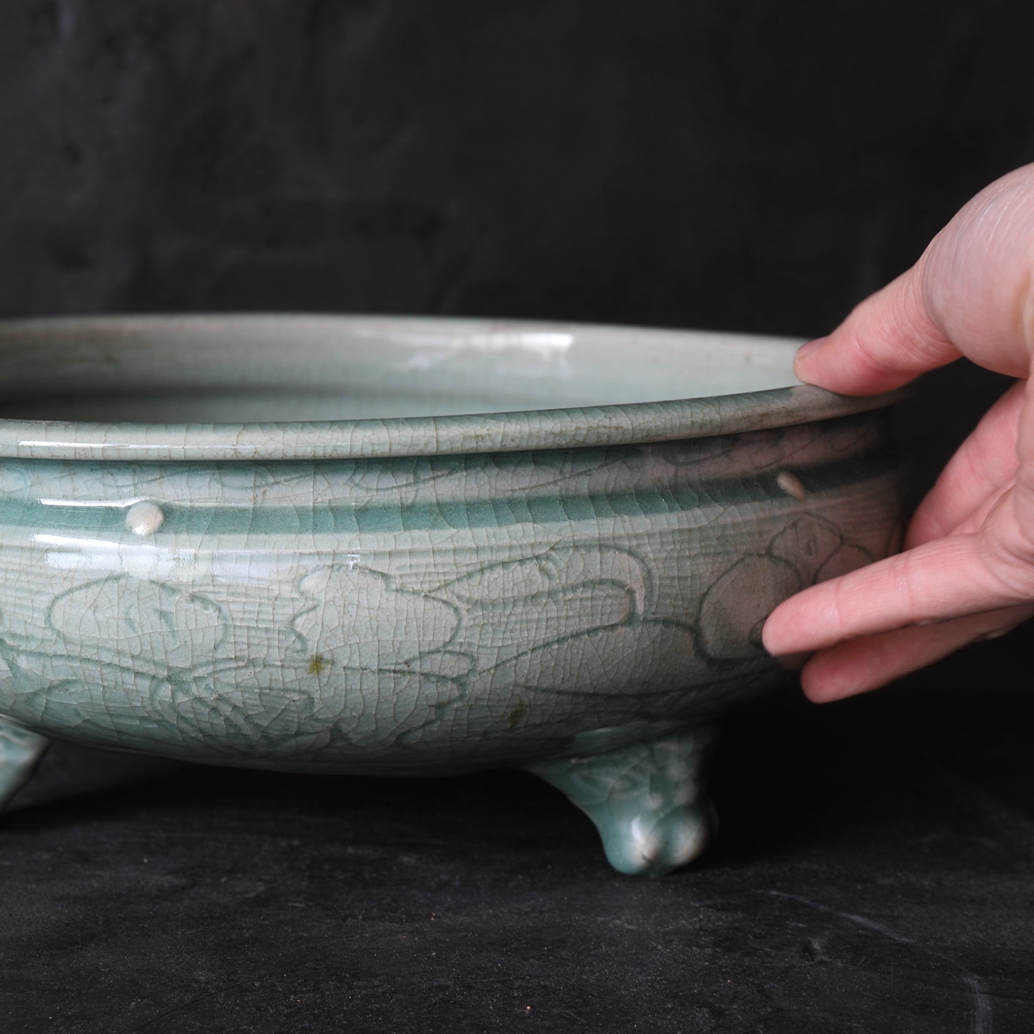 Celadon porcelain three-legged bowl with peony arabesque design Ming Dynasty/1368-1644CE