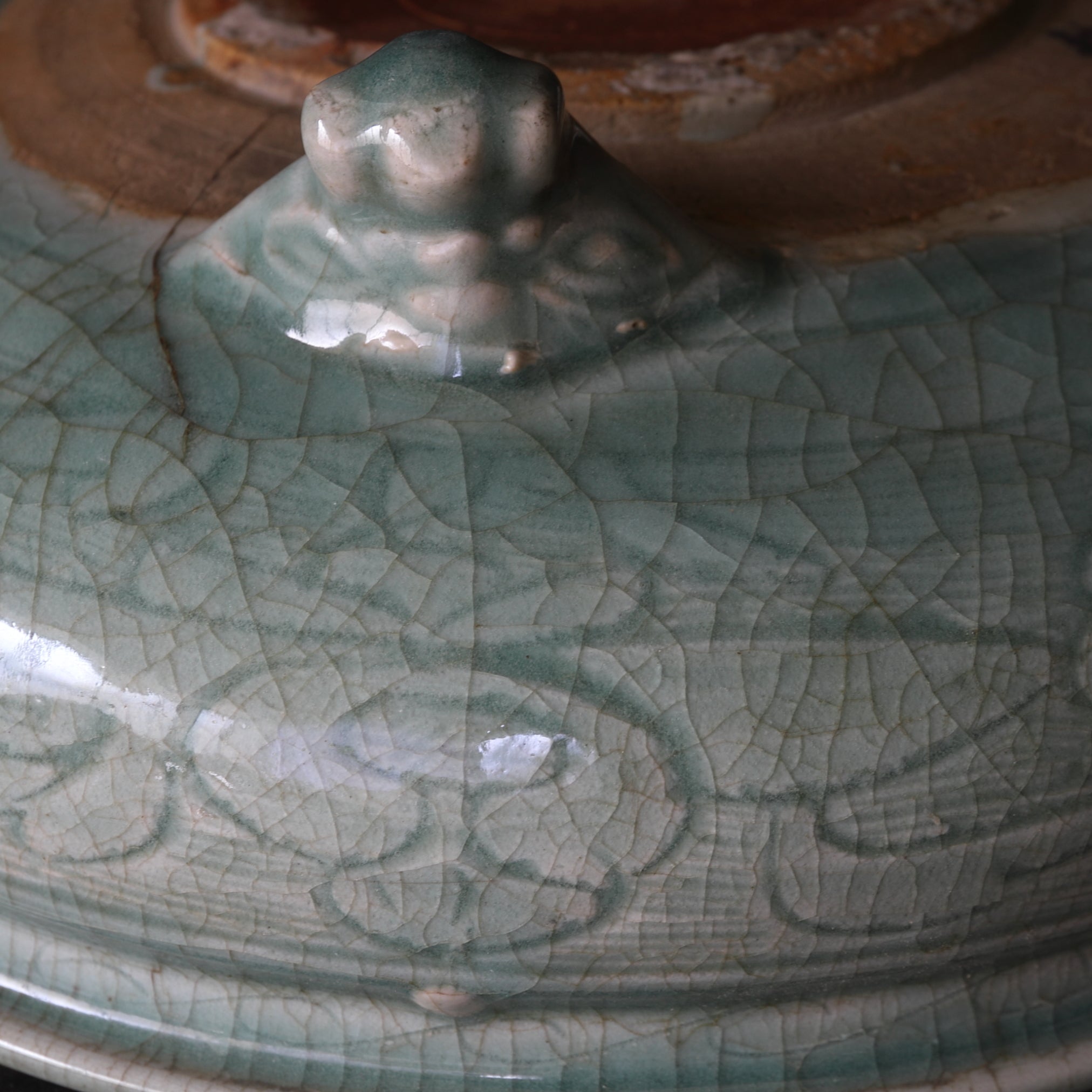 Celadon porcelain three-legged bowl with peony arabesque design Ming Dynasty/1368-1644CE