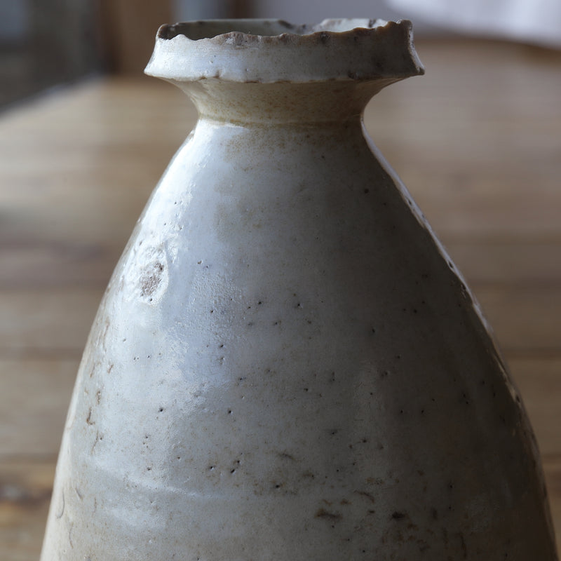 white porcelain sake bottle